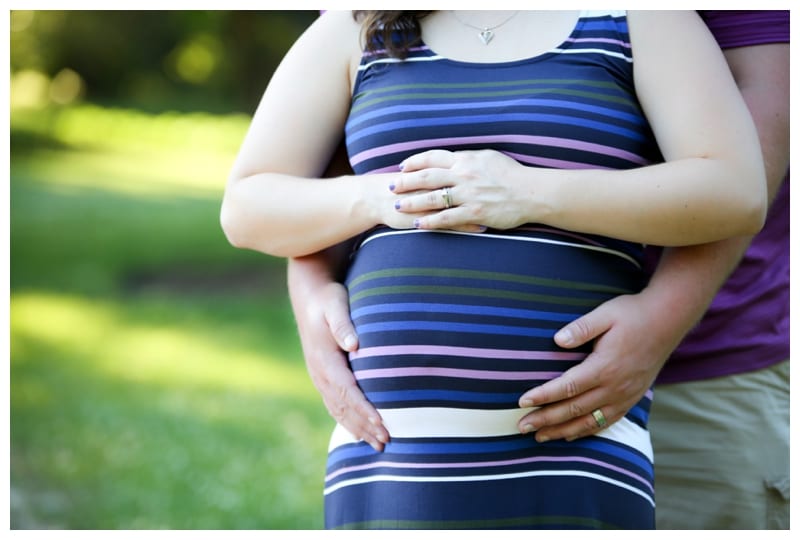 A mommy-to-be and her loving husband at Lake of the Woods Park in Mahomet, IL Photos