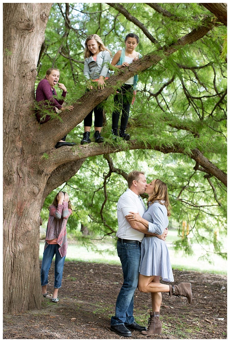 An Engaged Couple and their four girls at the Arboretum in Champaign, IL Photos by Ebby L Photography