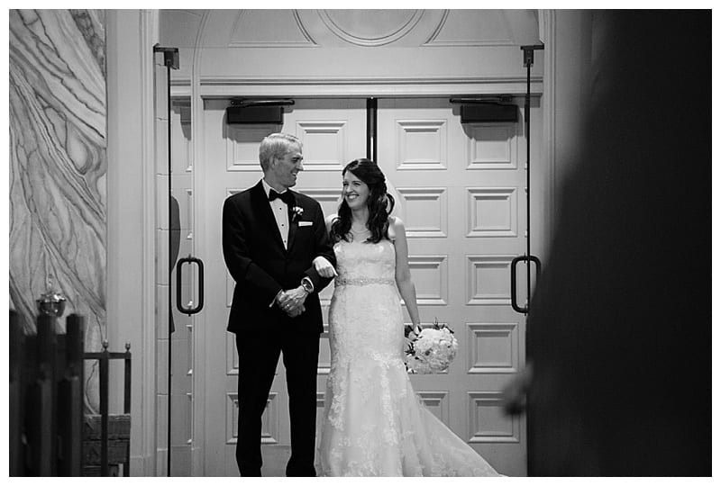 Champaign IL Holy Cross bride walking down aisle