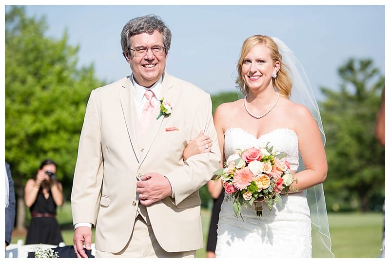 Dad walking daughter down the aisle