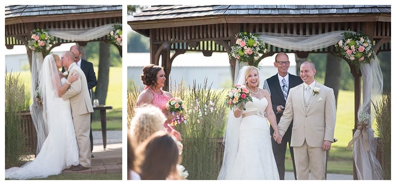 First kiss bride and groom outdoor wedding