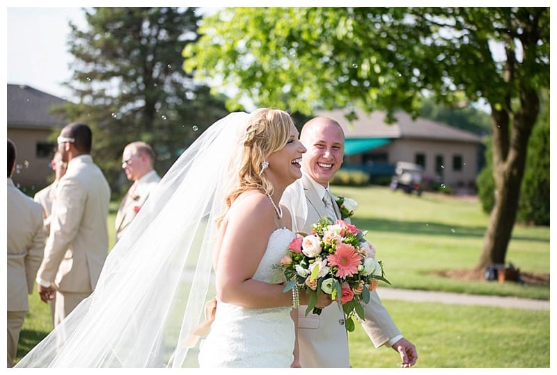Bride and groom walking down aisle