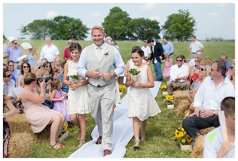 groom walking down aisle