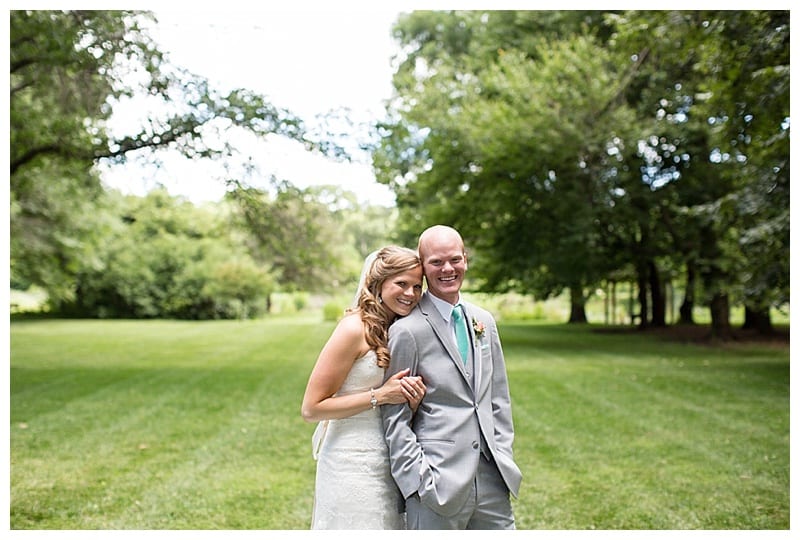 smiling bride and groom