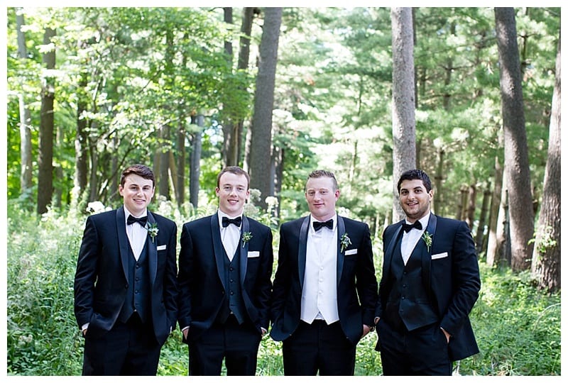 groomsmen in tuxes