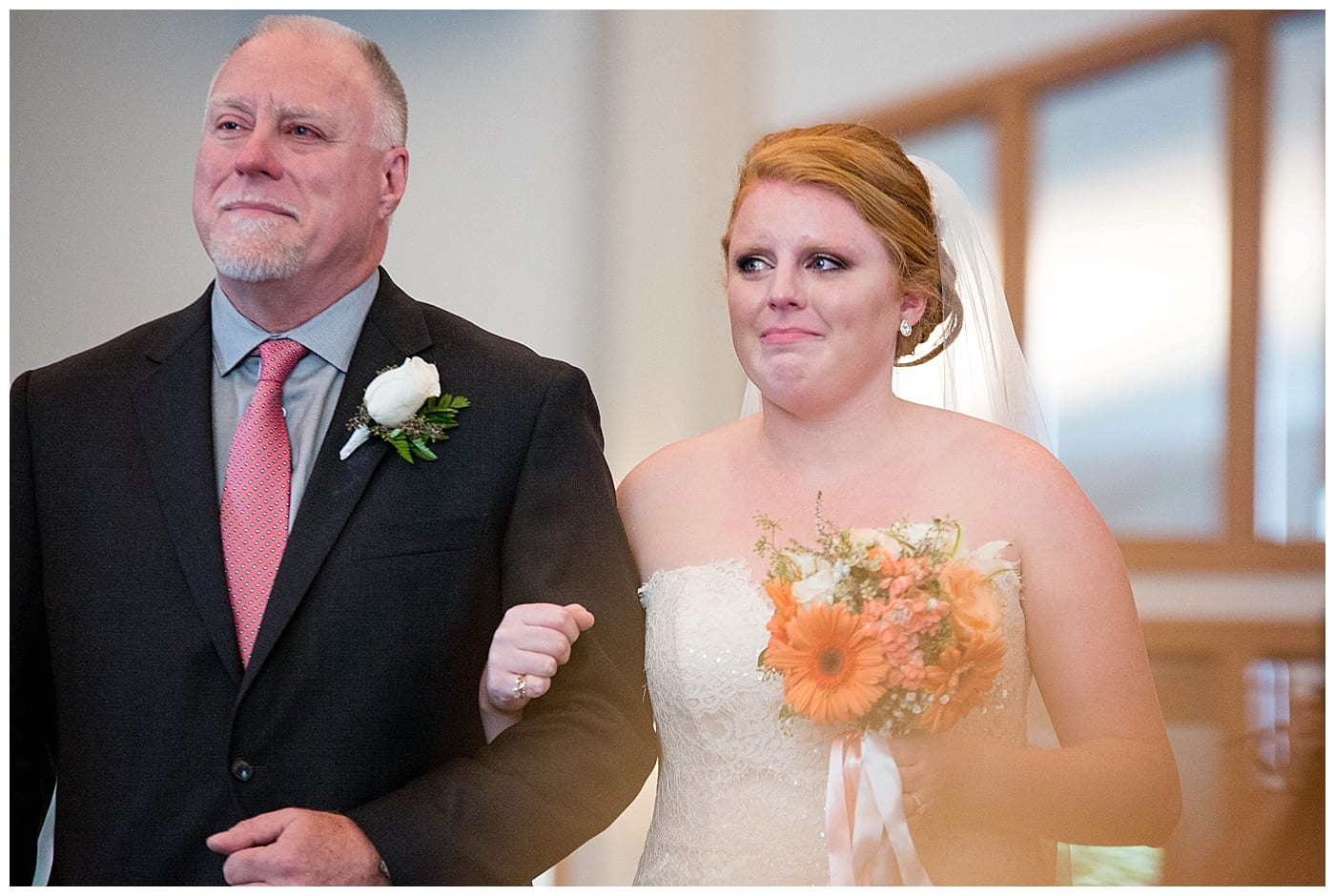 dad walking daughter down aisle